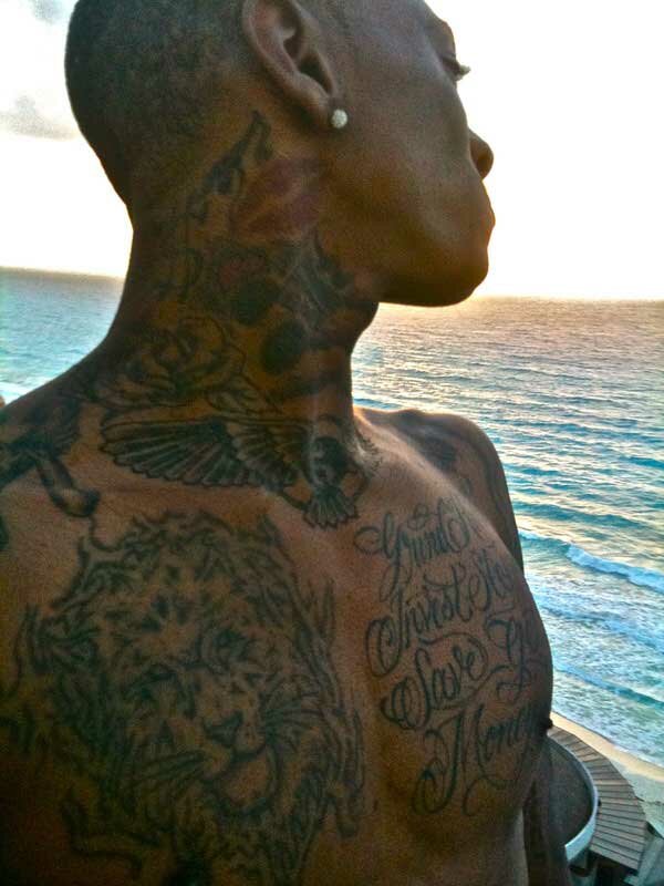 boy tattoos. of Soulja Boy body tattoos