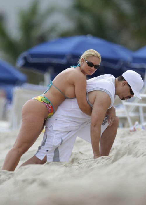 Photo of Nicole CoCo Austin on hubby IceT back in bikini on Miami beach