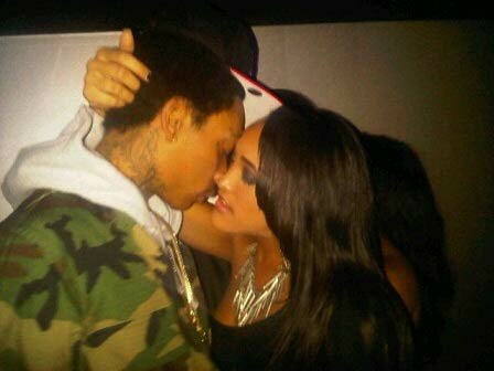 Photo of Wiz Khalifa and Natalie Nunn smoking weed and blowing shotguns