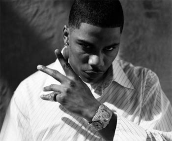 Nelly Throwing Peace Sign