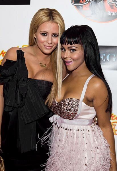 Aubrey O Day and Lil Kim on the red carpet at the Faces of Fashion Week soiree at RDV in New York
