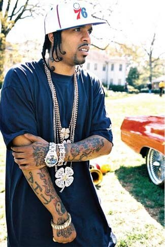 Photo of rapper Lil Flip sporting 76 hat