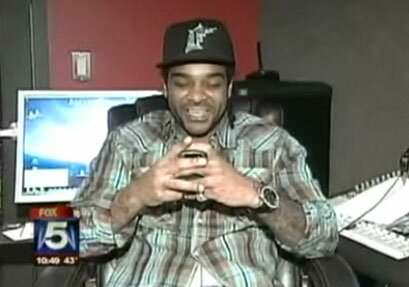 Jim Jones twittering during interview about arrest