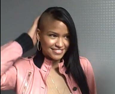 Photo of Cassie with half her hair shaved