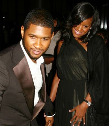 Photo of Usher Raymond and Tameka Foster