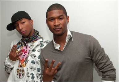 Photo of Usher and Pharrell
