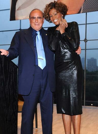 Photo of Whitney Houston and Clive Davis