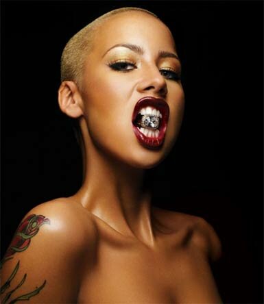 Photo of Amber Rose naked with diamond in her mouth