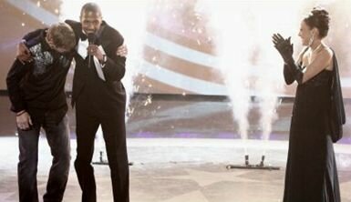 Photo of Nick Cannon Announcing Americas Got Talent Winner Kevin Skinner