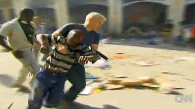 Photo: CNN Anchor Anderson Cooper Saves Haitian Boy