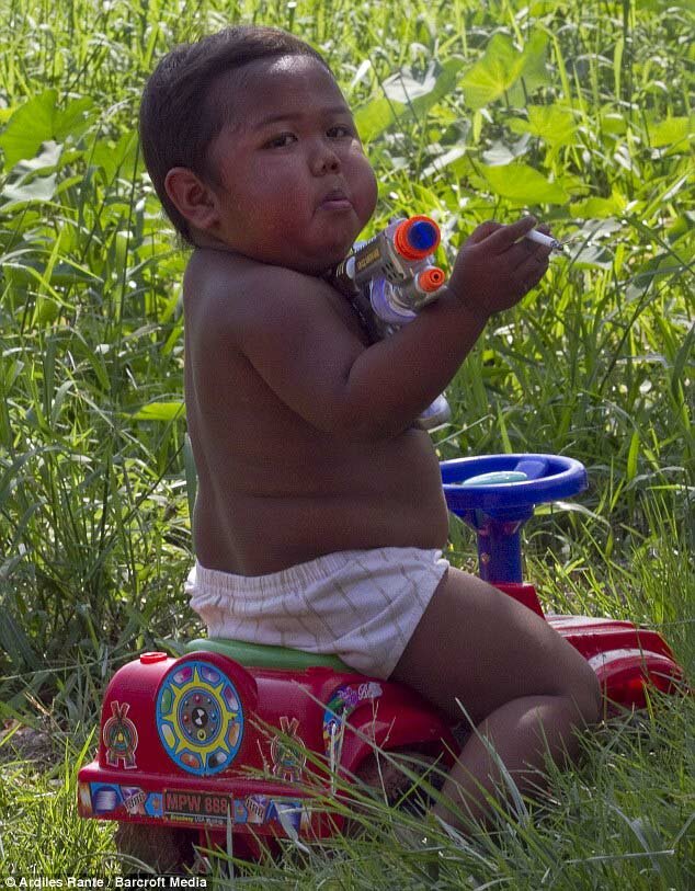 Picture of 2 Yr Old Indian Boy Addicted To Smoking 40 Cigarettes A day!