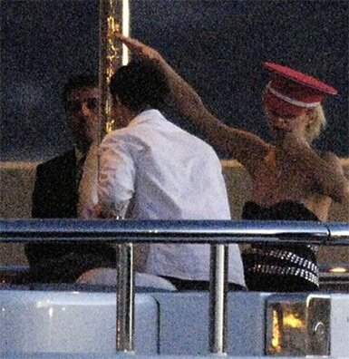 Photo of Paris Hilton holding her hand up in the Nazi Salute