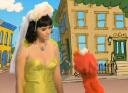 Photo of Katy Perry and Elmo on Sesame Street, Hot N Cold Music Video