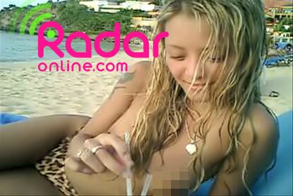 Photo of Tila Tequila Topless On Beach - Sex Tape Picture