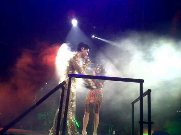 Photo of Kim Kardashian on stage with Prince