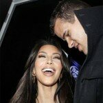 Photo of Kim Kardashian laughing with Kris Humphries