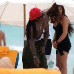 Photo of Lil Wayne on the beach with rumored new girlfriend.