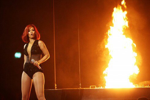 Photo of Rihanna and fire on stage